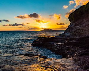 Preview wallpaper sunset, rocks, blocks, sun