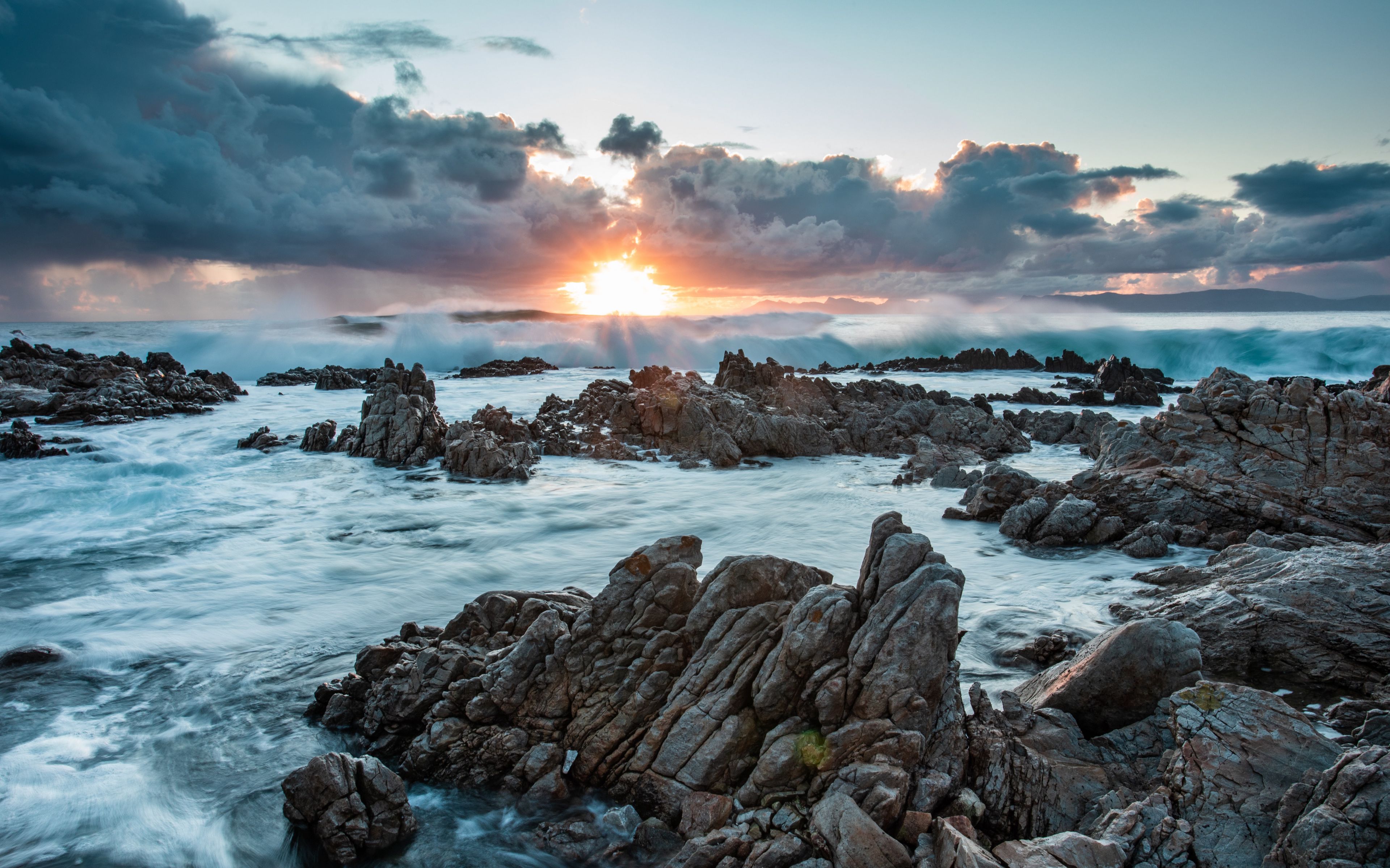 Download Wallpaper 3840x2400 Sunset Rocks Sea Stones Clouds 4k