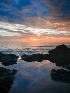 Preview wallpaper sunset, rocks, sea, clouds, stones