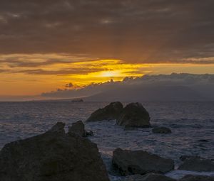 Preview wallpaper sunset, rocks, stones, waves