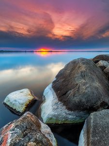 Preview wallpaper sunset, rocks, water, stones, landscape