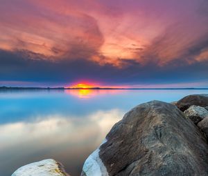 Preview wallpaper sunset, rocks, water, stones, landscape