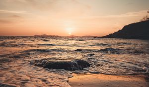 Preview wallpaper sunset, sea, beach, rocks, waves