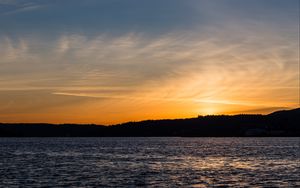 Preview wallpaper sunset, sea, glare, forest, trees