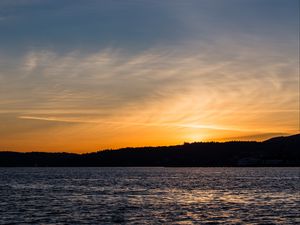 Preview wallpaper sunset, sea, glare, forest, trees