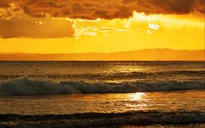 Preview wallpaper sunset, sea, horizon, clouds, glare