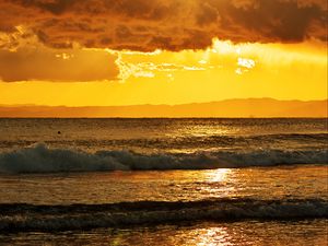 Preview wallpaper sunset, sea, horizon, clouds, glare