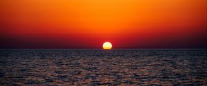 Preview wallpaper sunset, sea, horizon, glare, sky