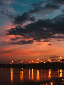 Preview wallpaper sunset, sea, lights, skyline, clouds, philippines