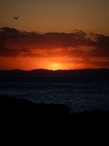 Preview wallpaper sunset, sea, mountains, dark, dusk