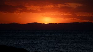 Preview wallpaper sunset, sea, mountains, dark, dusk