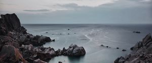 Preview wallpaper sunset, sea, rocks, sky
