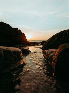 Preview wallpaper sunset, sea, rocks, water, nature