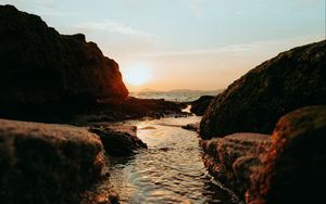Preview wallpaper sunset, sea, rocks, water, nature