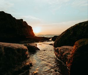 Preview wallpaper sunset, sea, rocks, water, nature