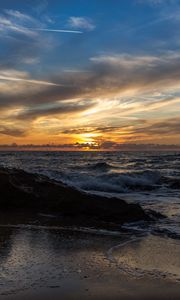 Preview wallpaper sunset, sea, rocks, coast, surf