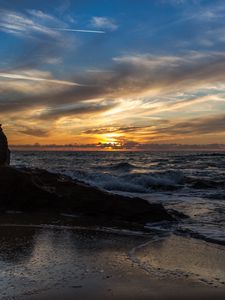 Preview wallpaper sunset, sea, rocks, coast, surf