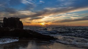 Preview wallpaper sunset, sea, rocks, coast, surf