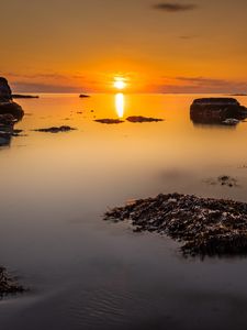 Preview wallpaper sunset, sea, rocks, horizon