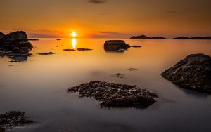 Preview wallpaper sunset, sea, rocks, horizon