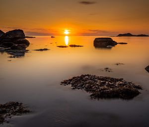 Preview wallpaper sunset, sea, rocks, horizon