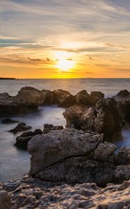 Preview wallpaper sunset, sea, rocks, water, landscape