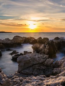 Preview wallpaper sunset, sea, rocks, water, landscape