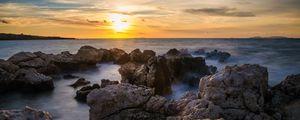 Preview wallpaper sunset, sea, rocks, water, landscape