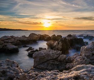 Preview wallpaper sunset, sea, rocks, water, landscape
