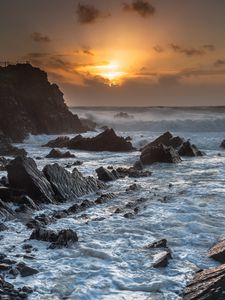 Preview wallpaper sunset, sea, rocks, waves, landscape