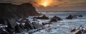 Preview wallpaper sunset, sea, rocks, waves, landscape