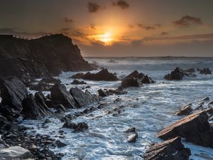 Preview wallpaper sunset, sea, rocks, waves, landscape