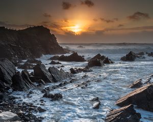 Preview wallpaper sunset, sea, rocks, waves, landscape