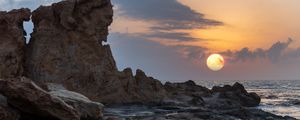 Preview wallpaper sunset, sea, rocks, sun, summer, landscape