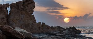 Preview wallpaper sunset, sea, rocks, sun, summer, landscape