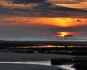 Preview wallpaper sunset, sea, ship, shore, dusk