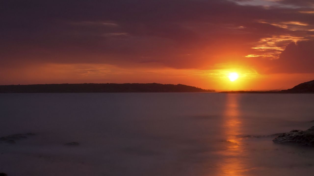 Wallpaper sunset, sea, stones, horizon