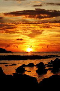 Preview wallpaper sunset, sea, stones, landscape, dark