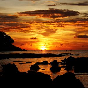 Preview wallpaper sunset, sea, stones, landscape, dark