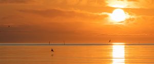 Preview wallpaper sunset, sea, sun, clouds, reflection
