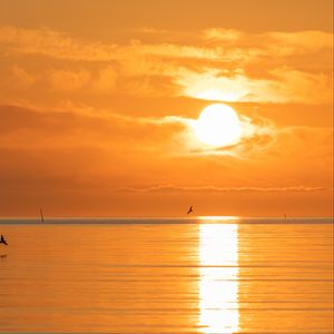 Preview wallpaper sunset, sea, sun, clouds, reflection