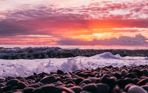Preview wallpaper sunset, sea, waves, shore, pebbles