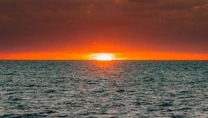 Preview wallpaper sunset, sea, waves, sun, clouds, horizon