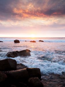 Preview wallpaper sunset, sea, waves, stones, landscape