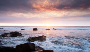 Preview wallpaper sunset, sea, waves, stones, landscape