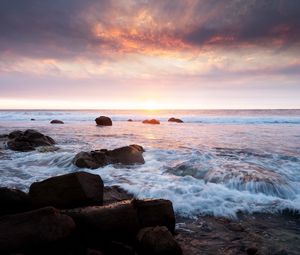 Preview wallpaper sunset, sea, waves, stones, landscape