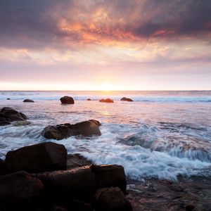 Preview wallpaper sunset, sea, waves, stones, landscape