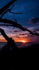 Preview wallpaper sunset, shore, clouds, sea