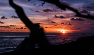 Preview wallpaper sunset, shore, clouds, sea