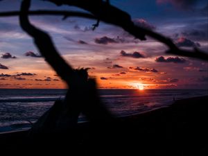 Preview wallpaper sunset, shore, clouds, sea